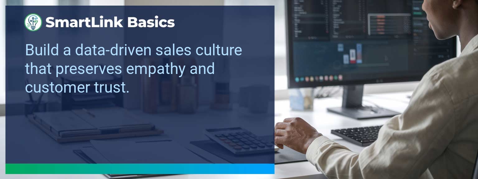 Sales leader reviewing dashboard with team to build a Data Driven Sales culture